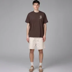 Sporty & Rich T-Shirts*Crest Seal 100th T Shirt Chocolate Cream